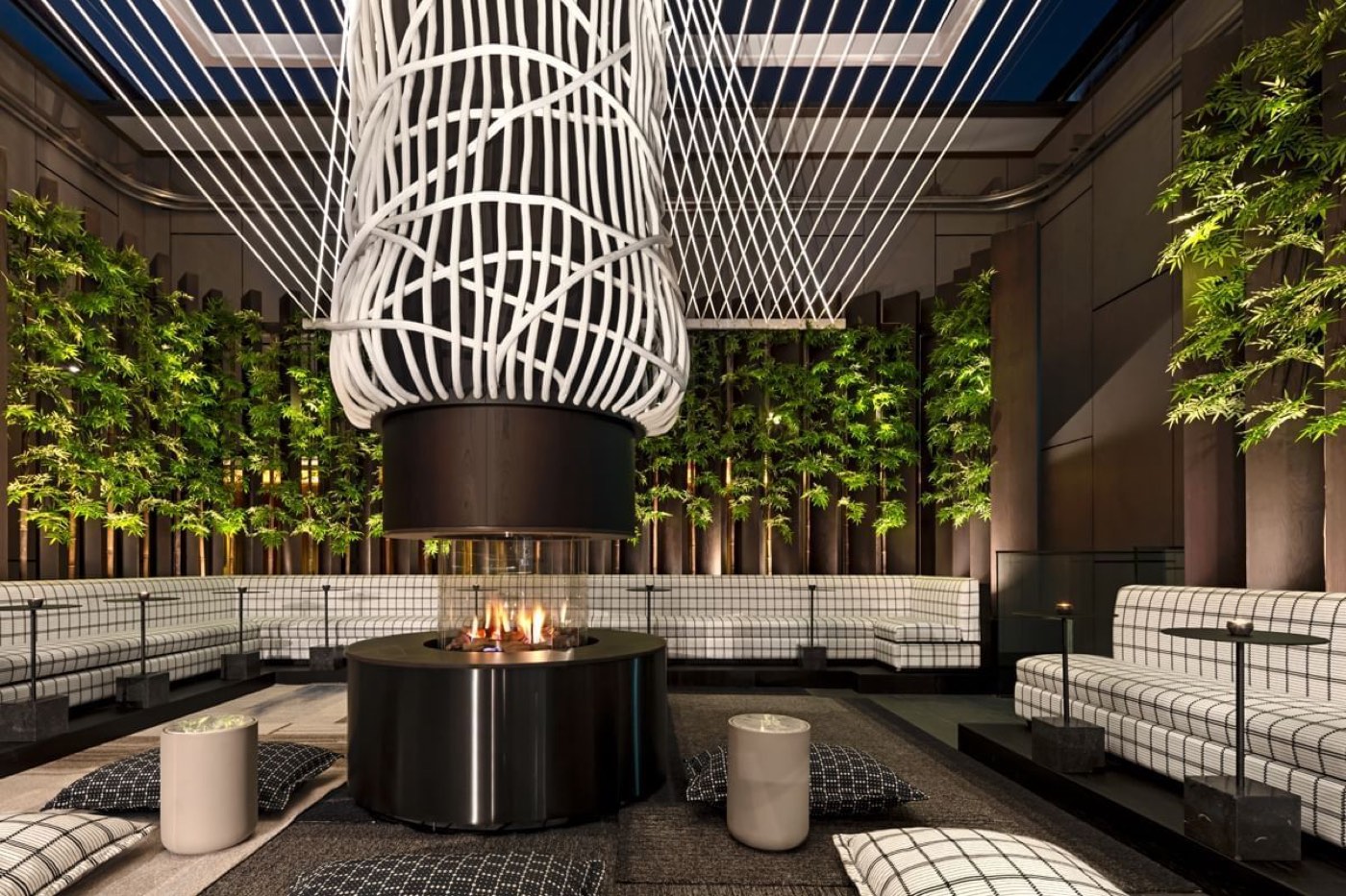 The atrium lounge at The Londoner, London, where the group operates a salon.